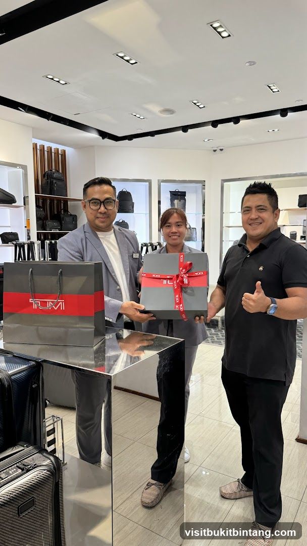 Tumi Store Staff Presenting Gift
