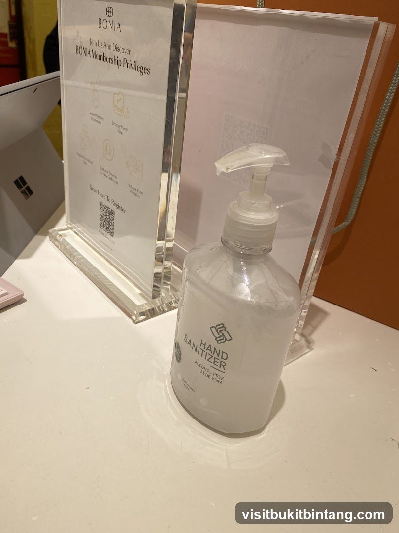 BONIA Membership Privileges Sign and Hand Sanitizer