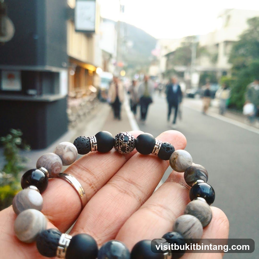 Beaded bracelet held in hand