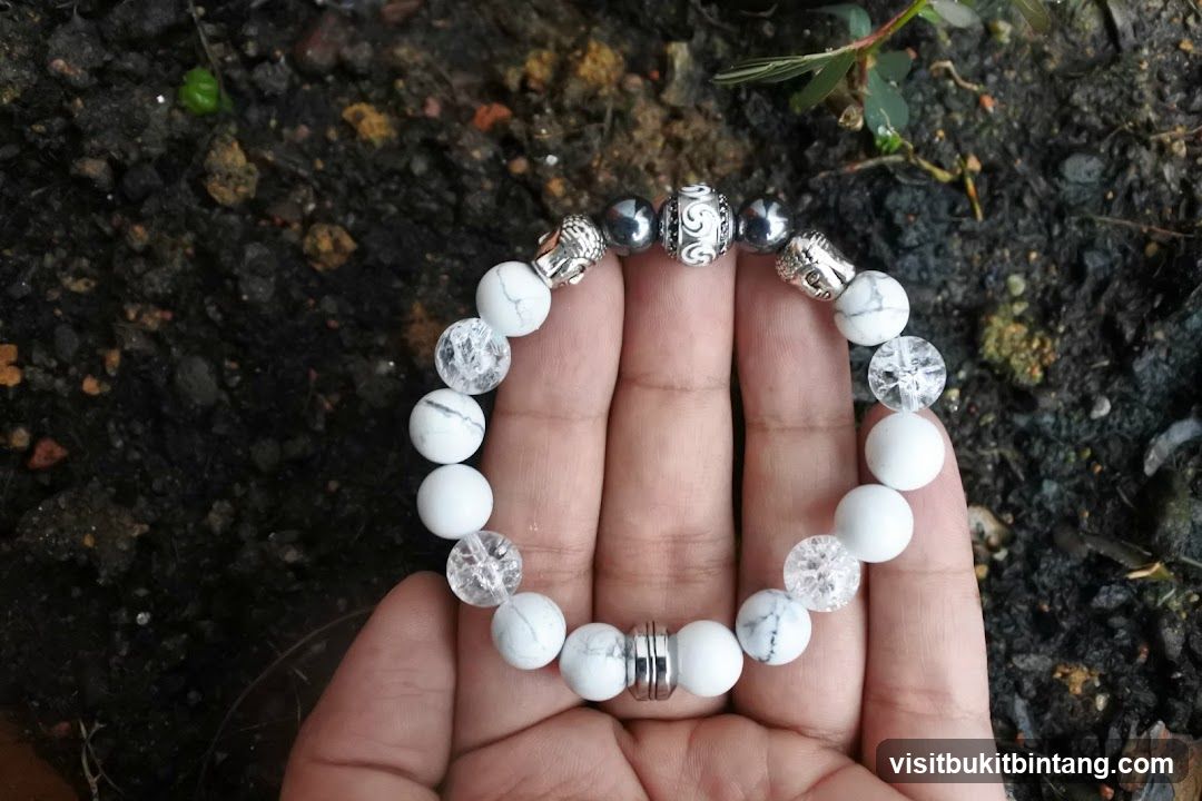 White Beaded Bracelet with Buddha Charms