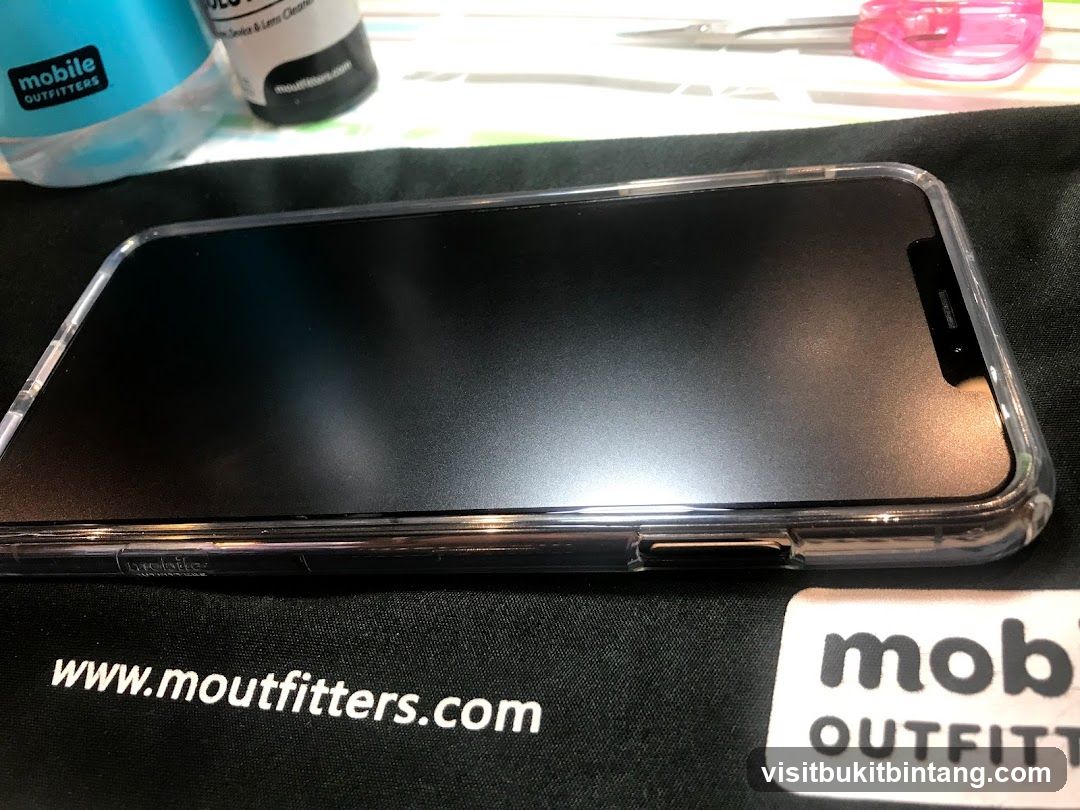 Phone with screen protector and accessories