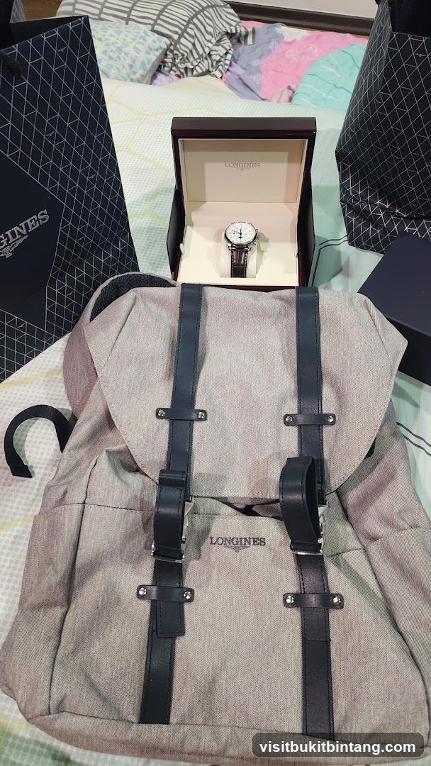 Longines watch and backpack