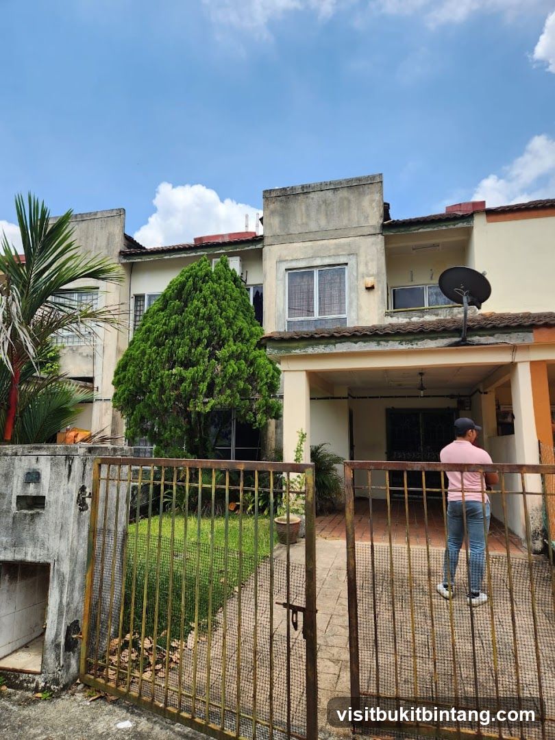 Residential building with a man standing in front of the entrance