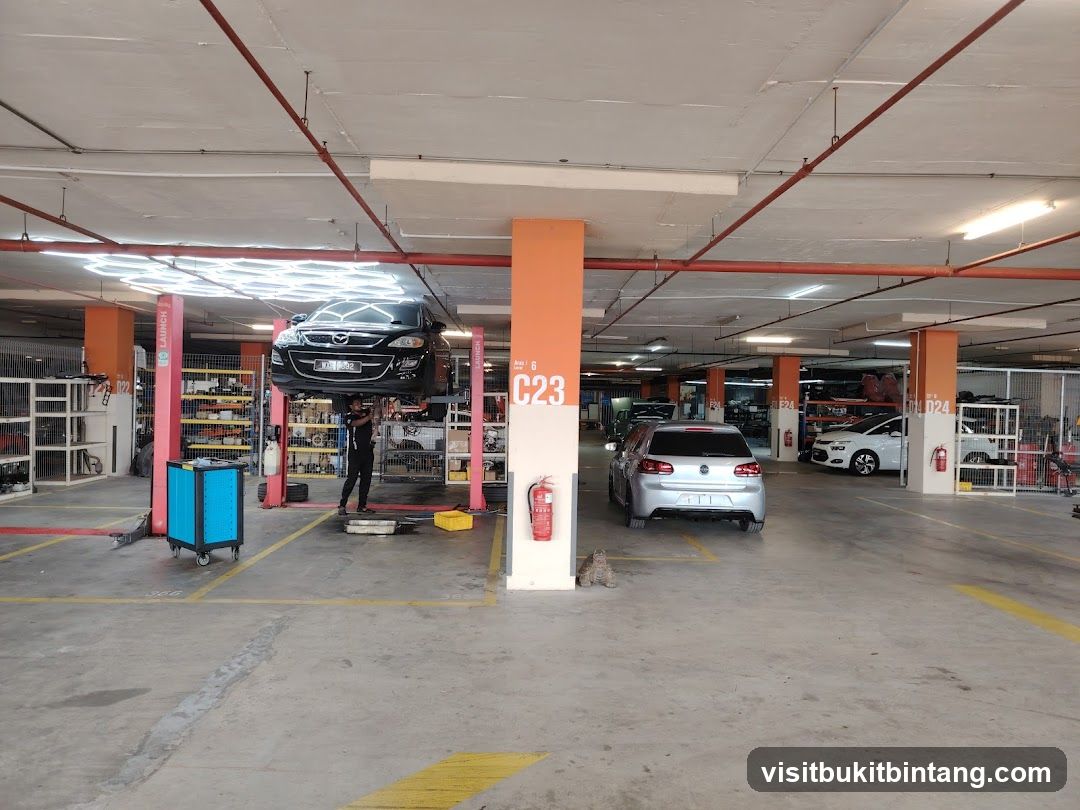 Car repair shop with vehicles being serviced