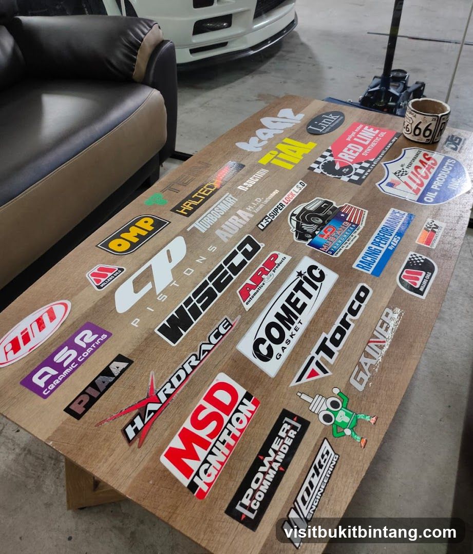 Table covered in car-related stickers