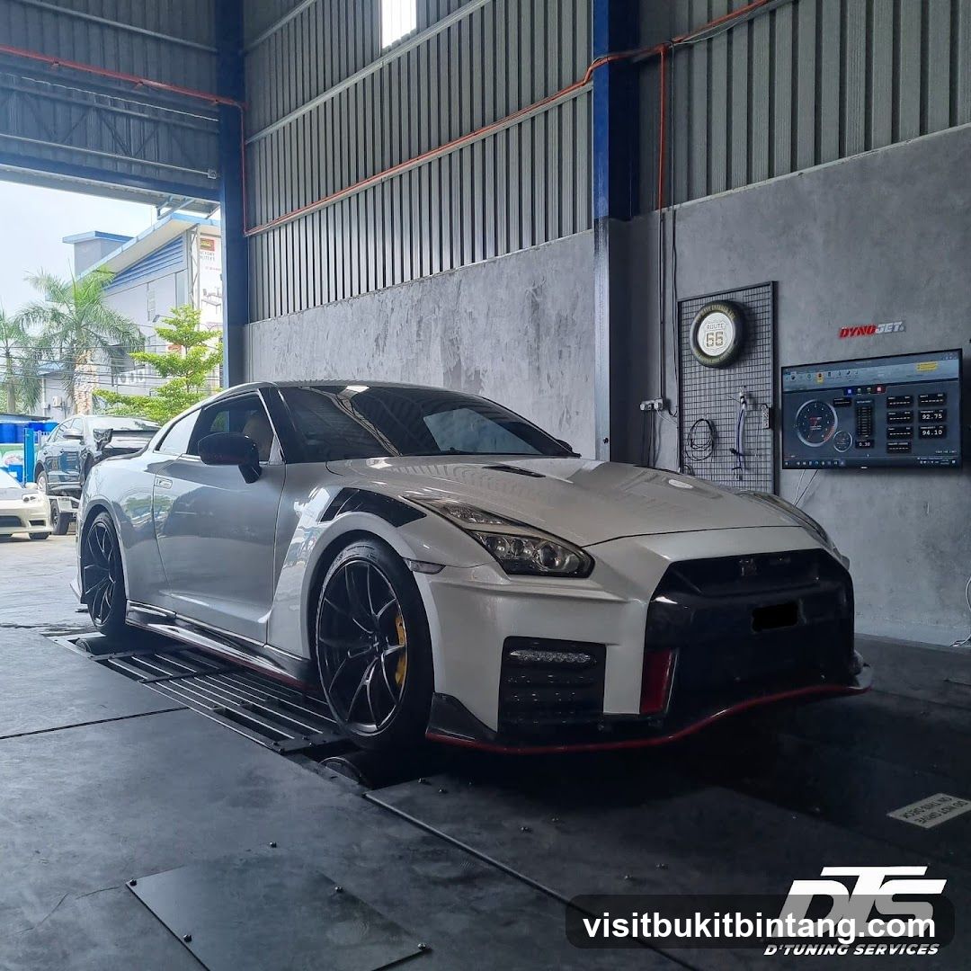 White Nissan GT-R on a dynamometer
