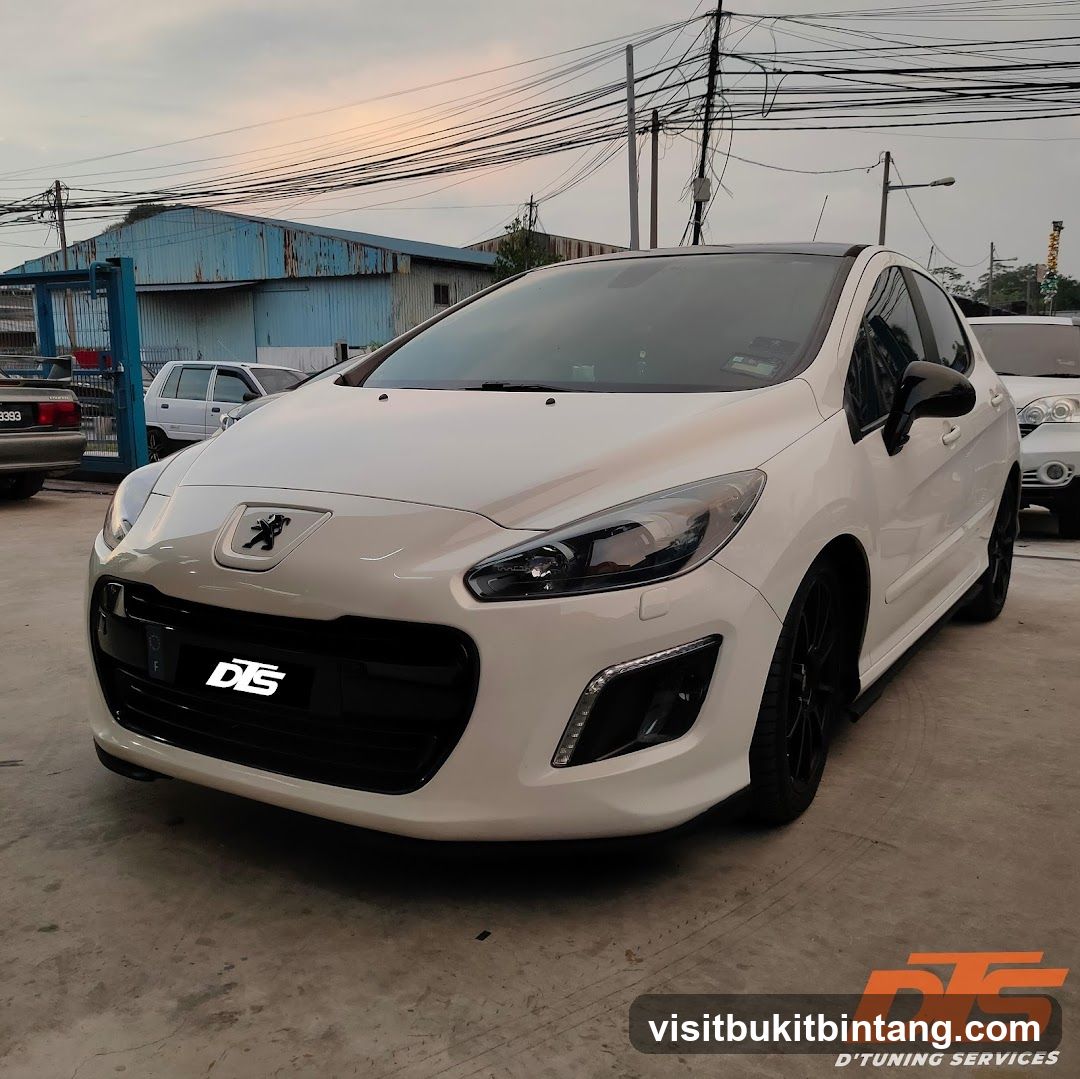 White Peugeot Car