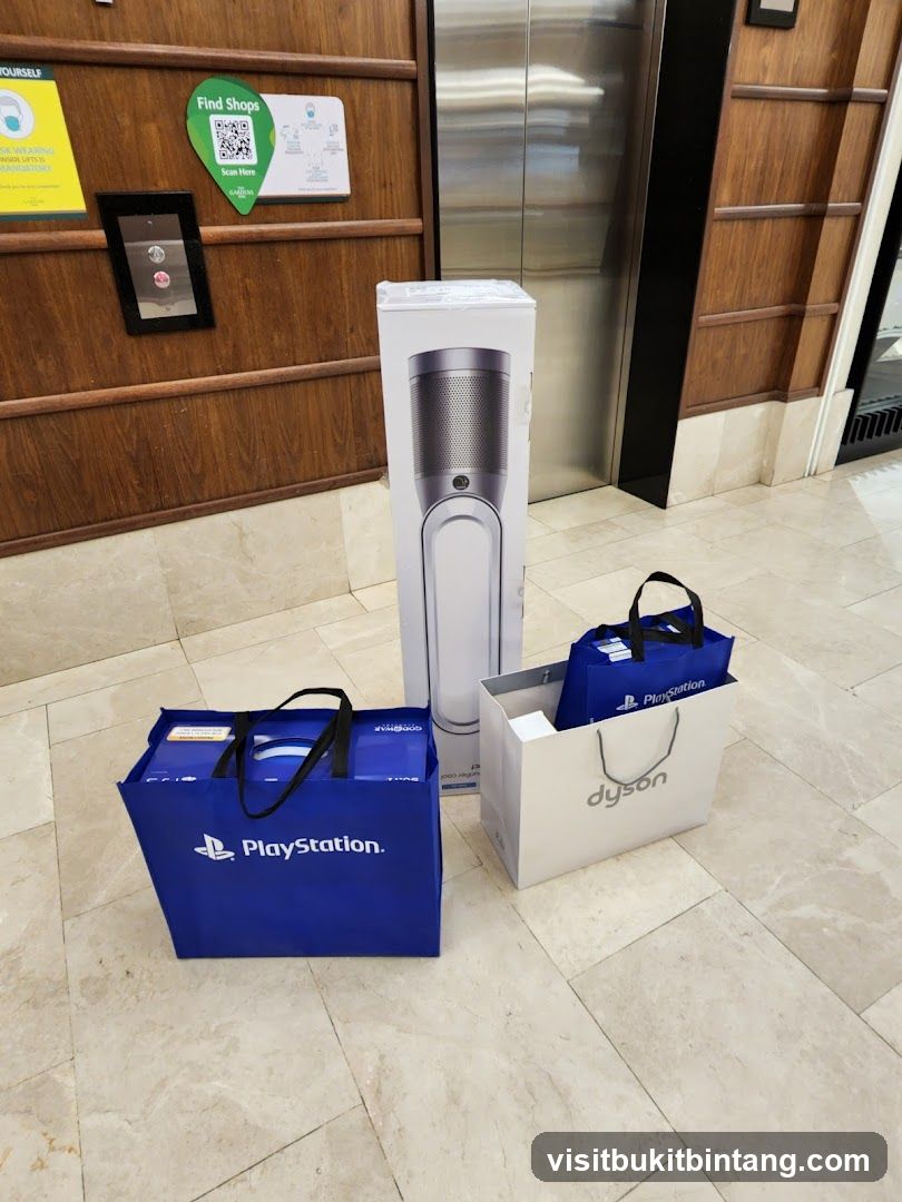Shopping bags and a Dyson product