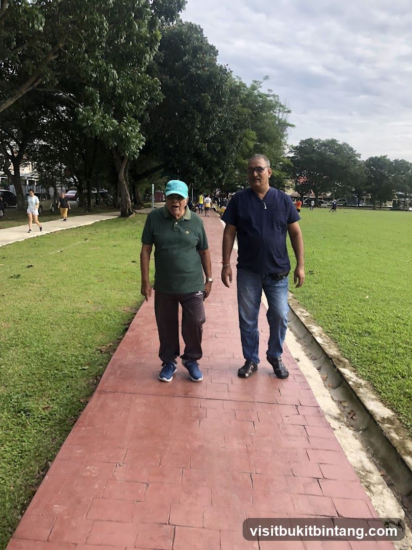Two men walking on a path