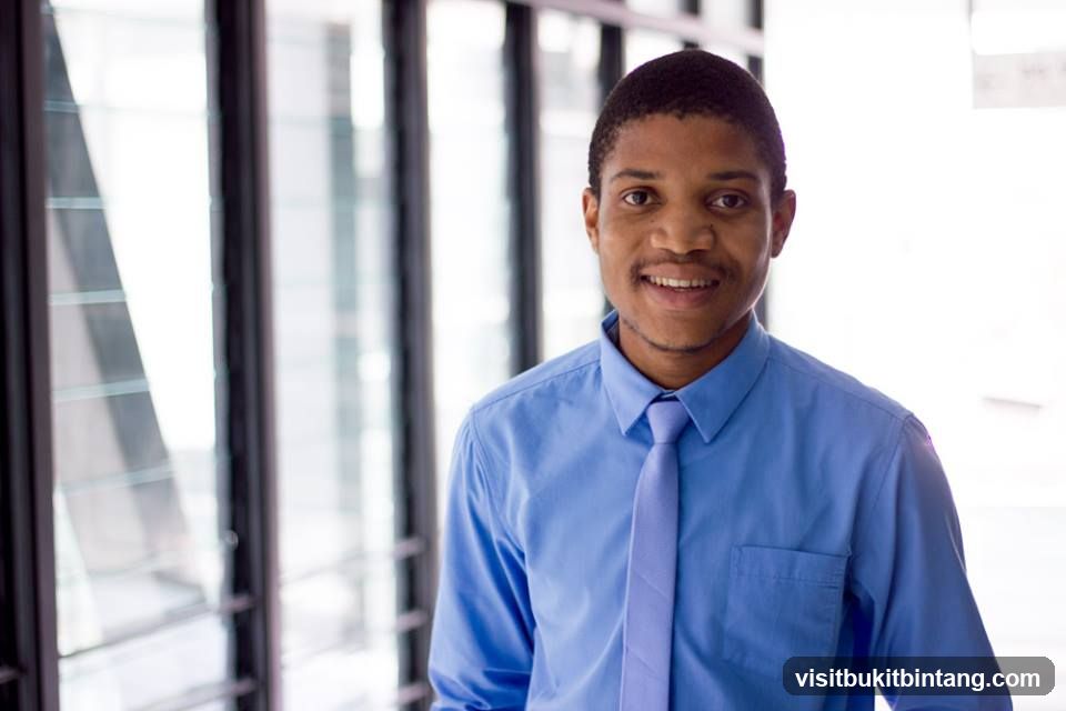 Man in Blue Shirt and Tie
