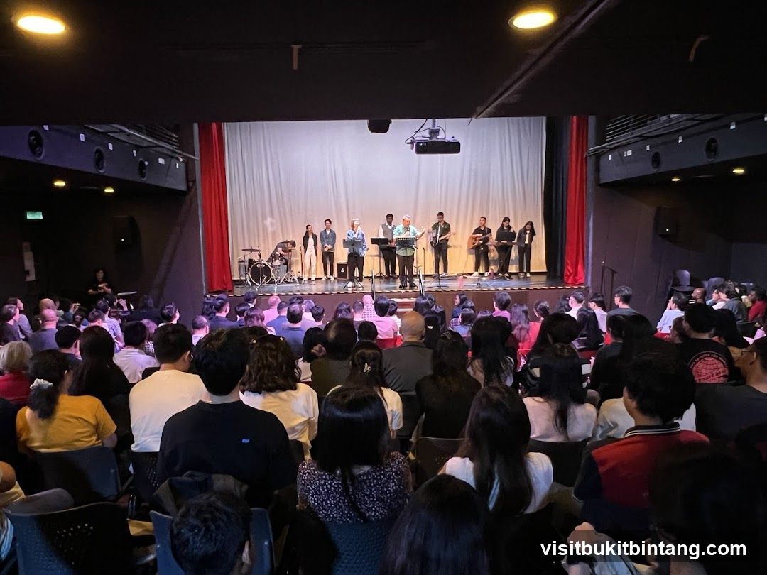 Audience watching a performance on stage