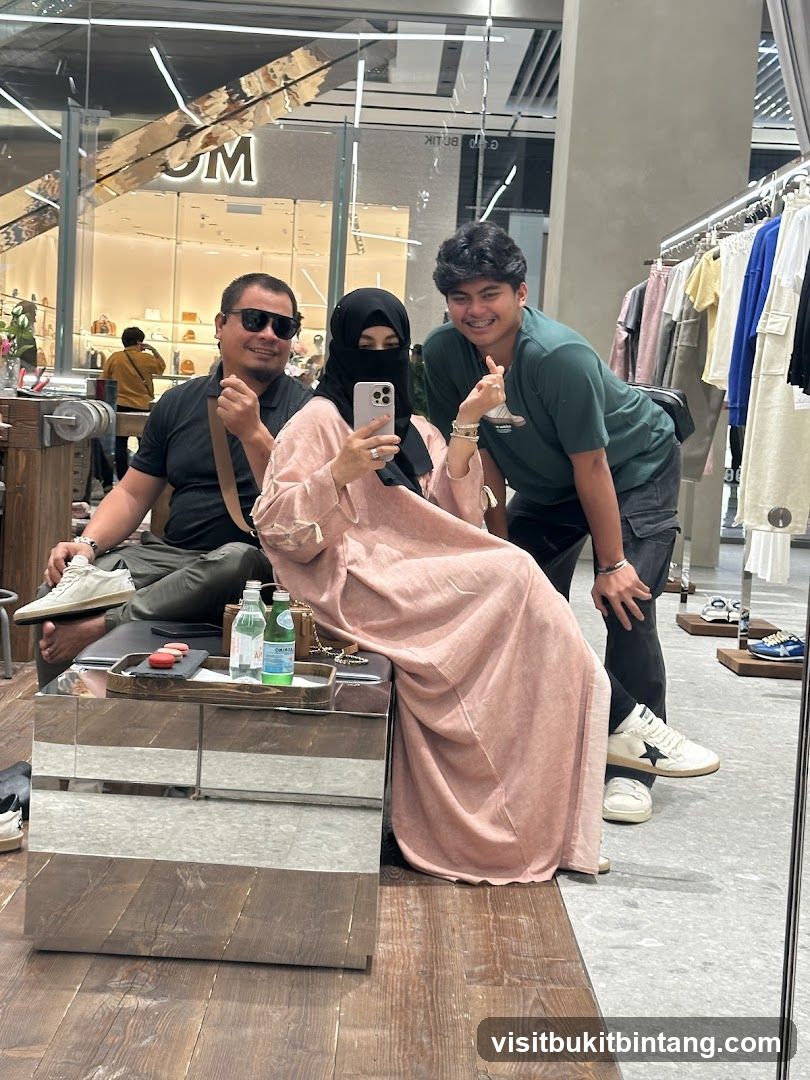 People posing for a mirror selfie in a store