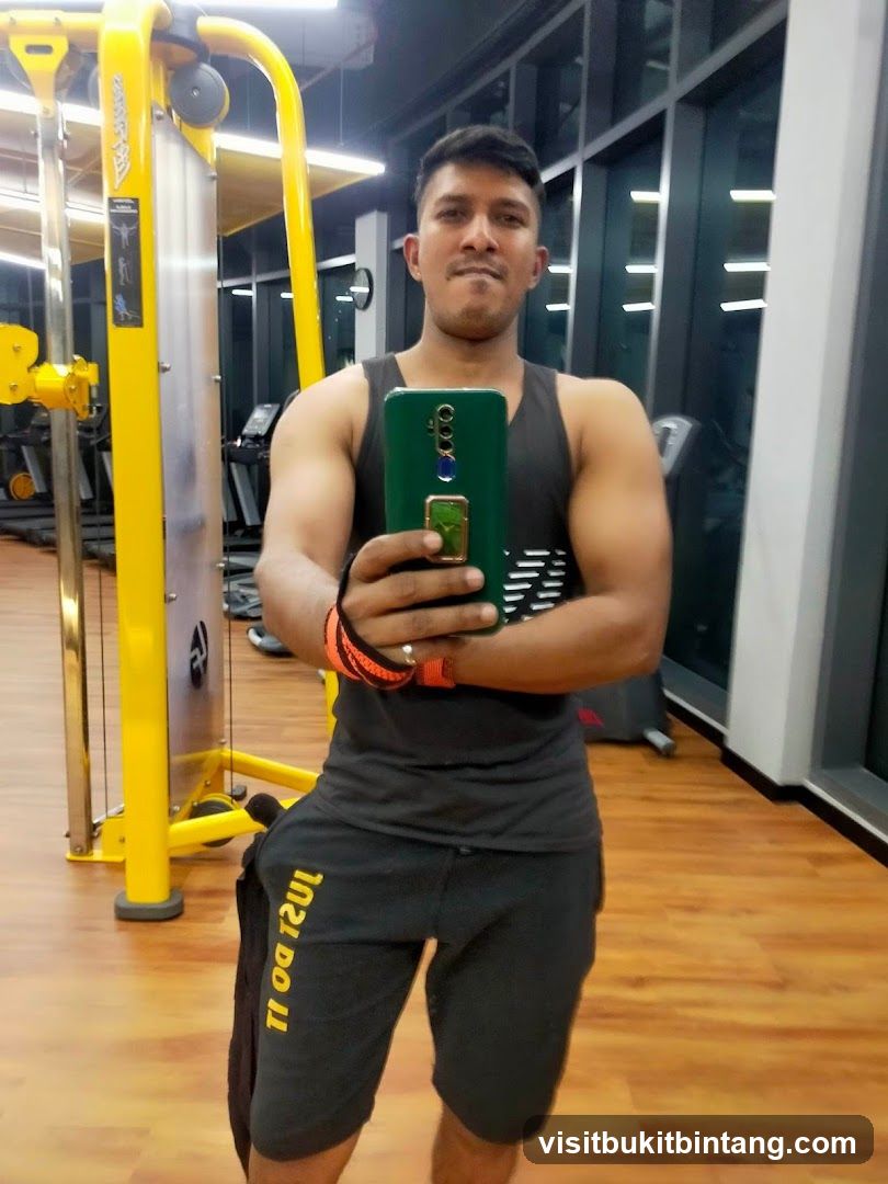 Man taking a selfie in a gym