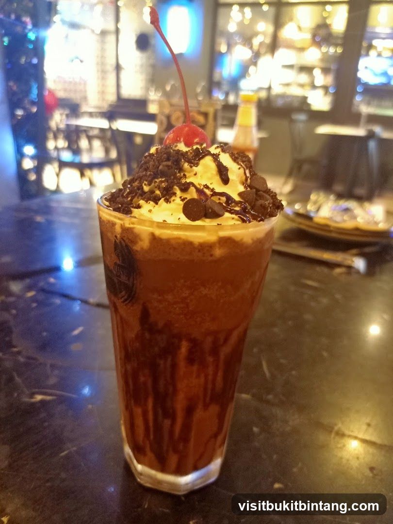 Chocolate Frappe with Whipped Cream and Cherry