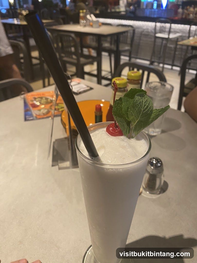 White Drink with Cherry and Mint
