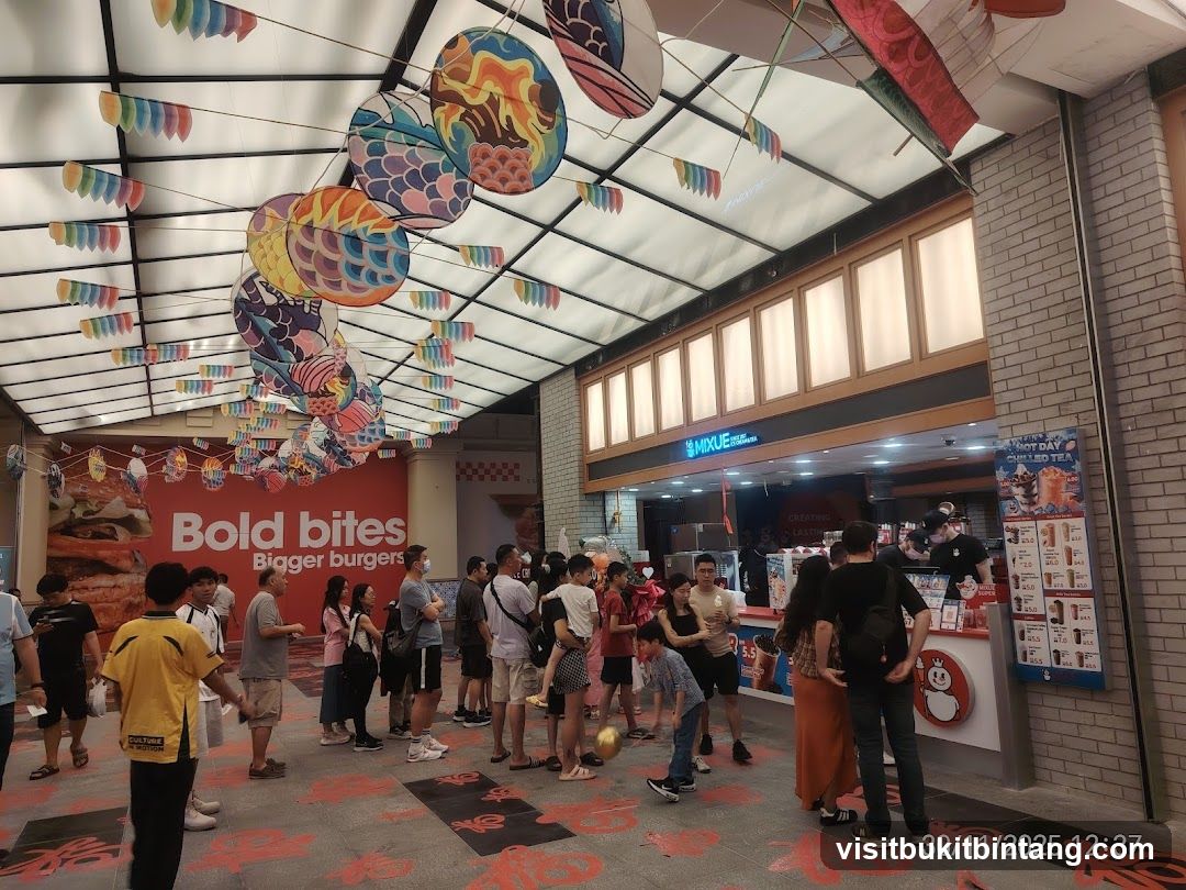 People queuing at a food stall
