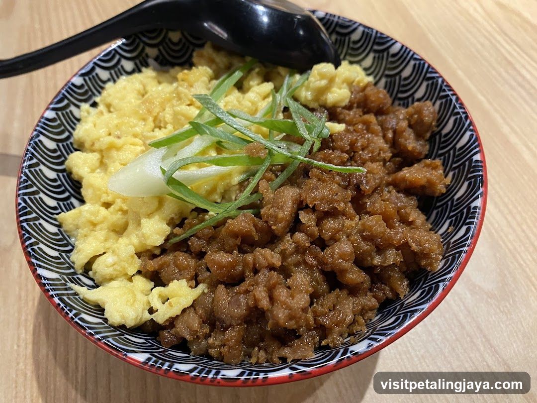 Bowl of Japanese-style rice with meat and egg