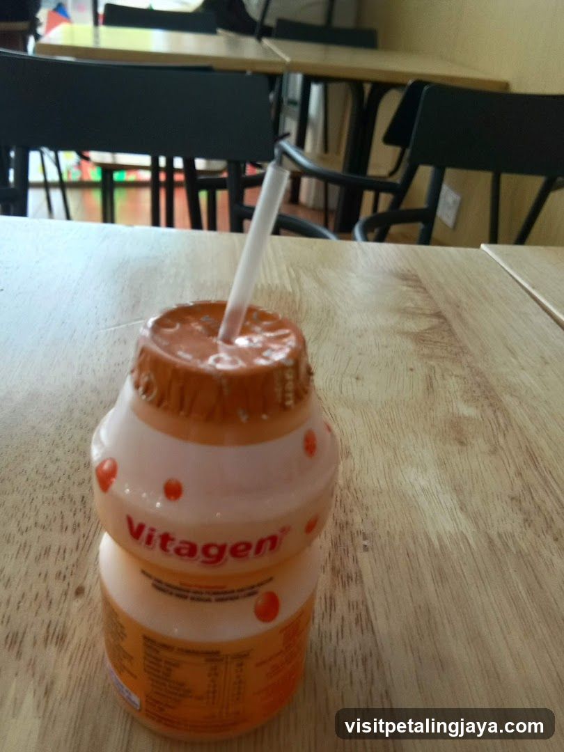 Vitagen Juice Bottle on Table
