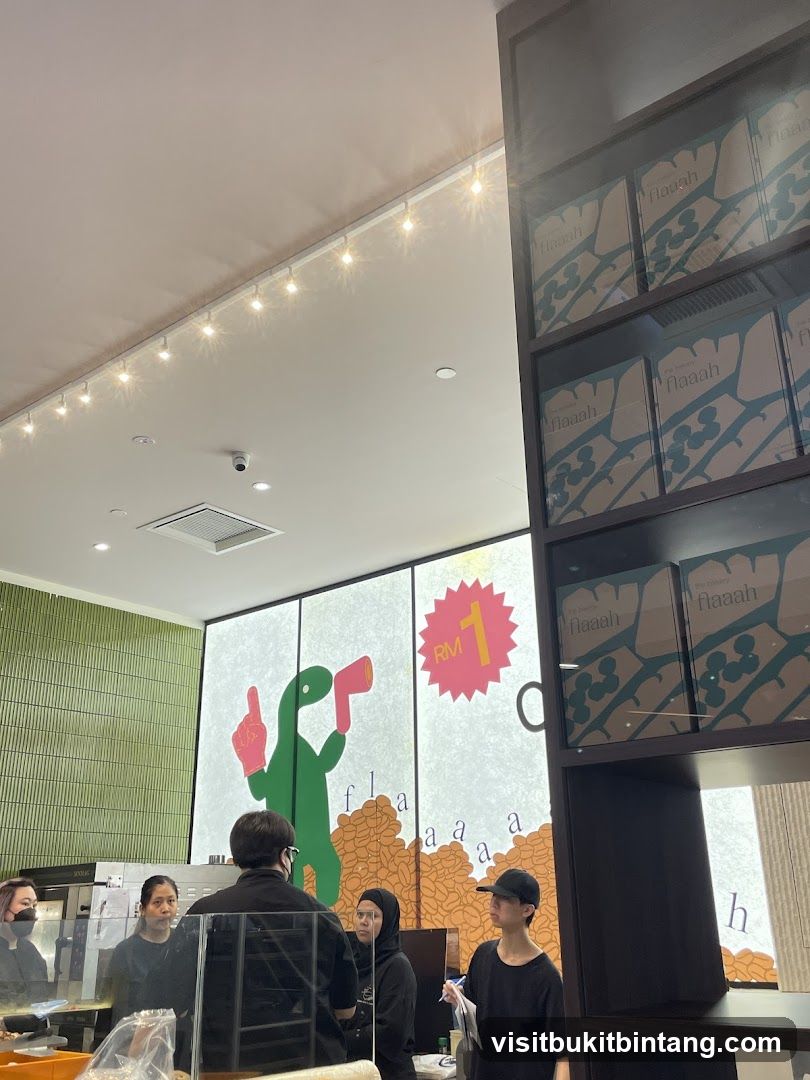 Interior of a cafe with staff and merchandise