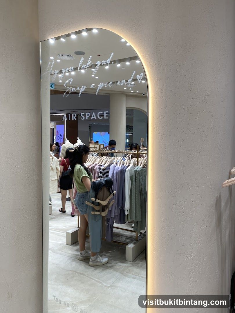 Mirror with text and clothing racks