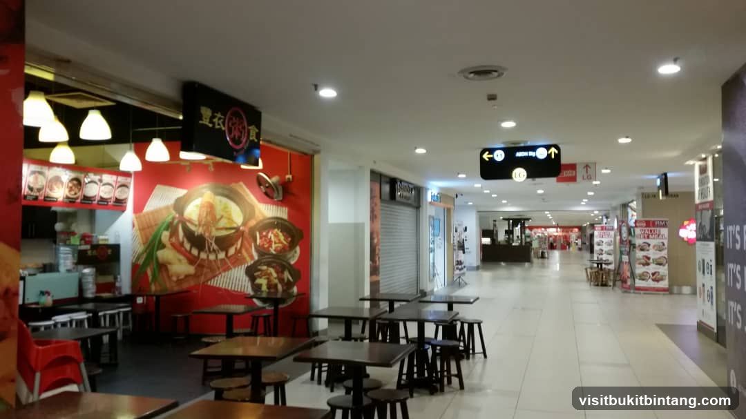 Restaurant Interior with Seating and Food Displays