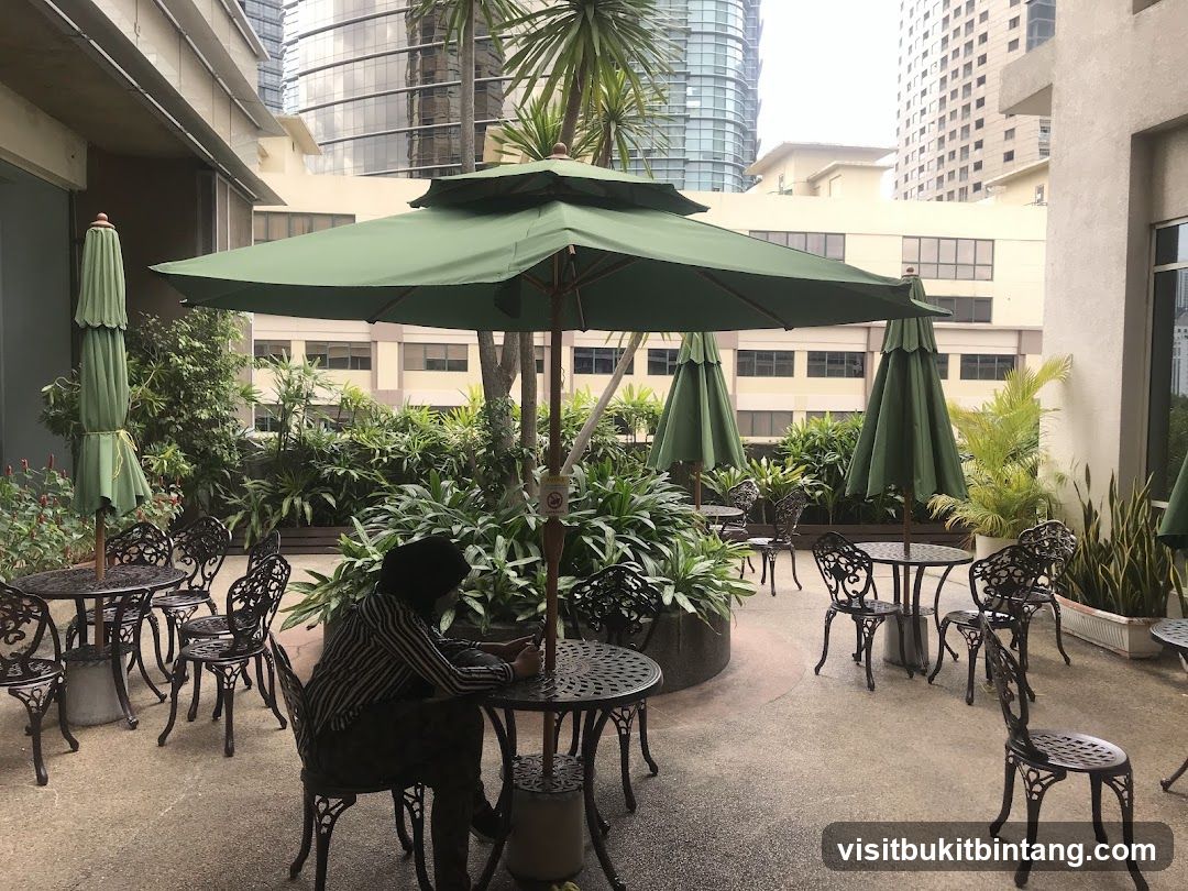 Outdoor Seating Area with Umbrellas and Plants