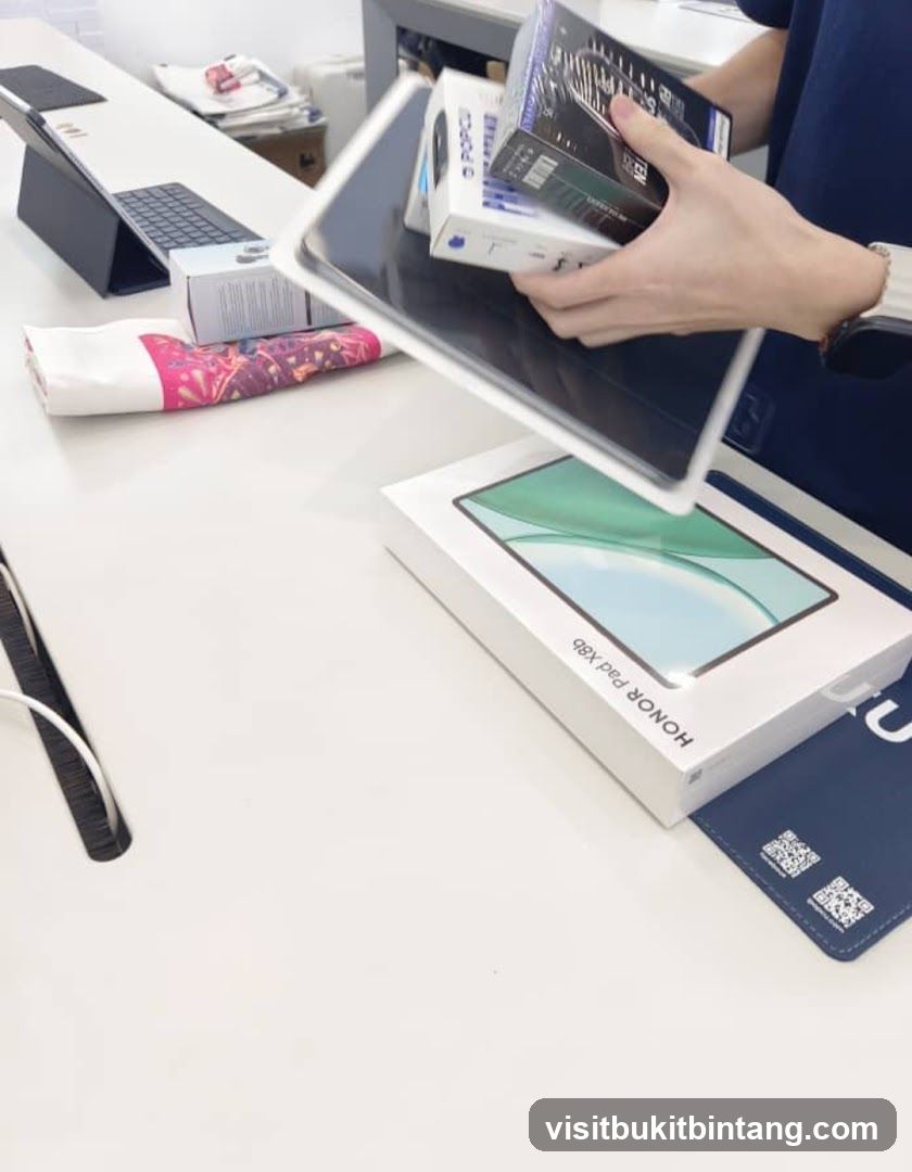 Person holding electronic devices