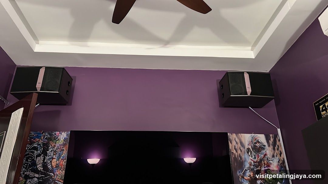 Purple Room Interior with Speakers and Posters