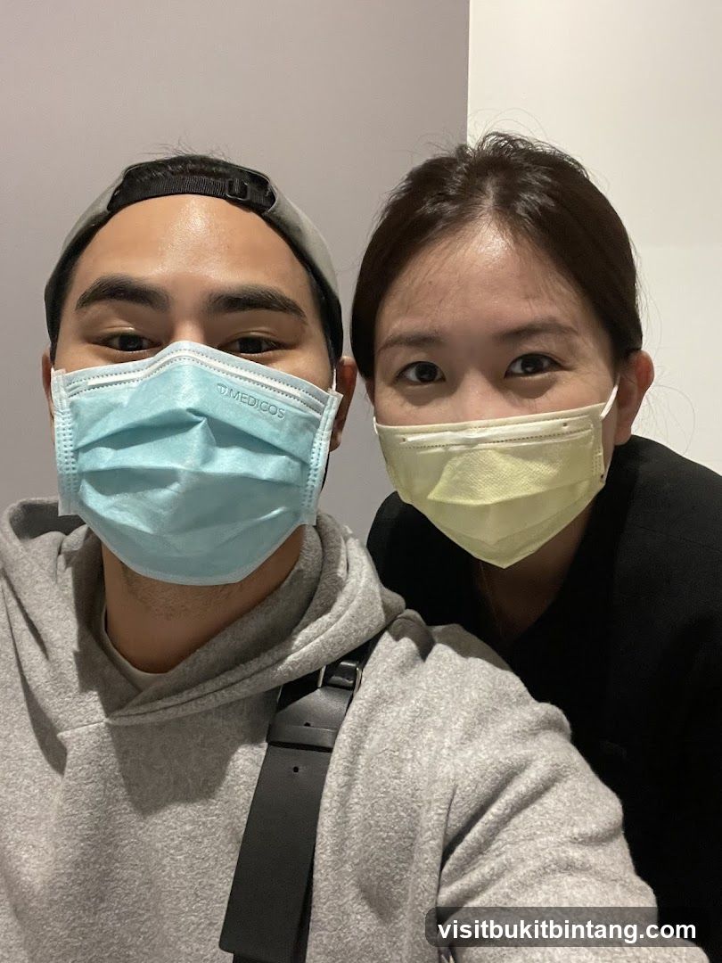 Two people wearing face masks