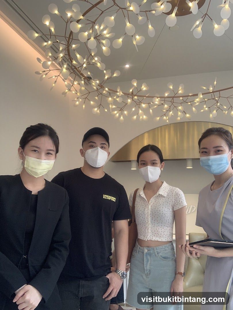 Four people wearing masks