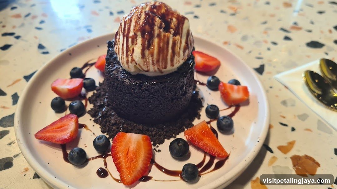 Chocolate Lava Cake with Ice Cream and Berries