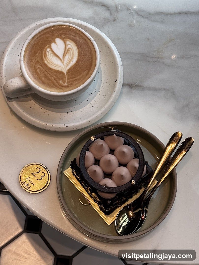 Latte and Dessert on Marble Table