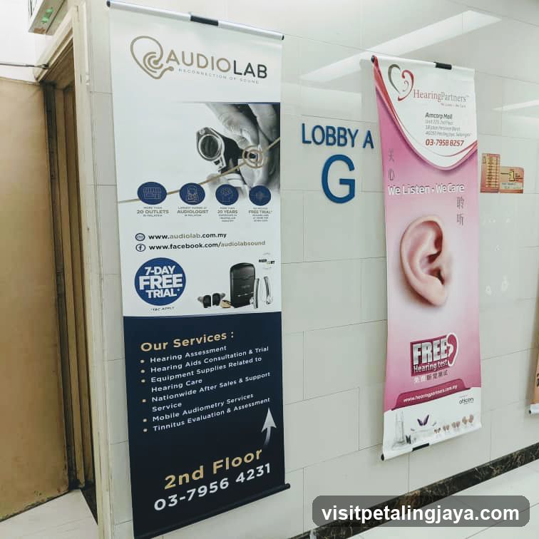 Audio Lab and Hearing Partners banners in lobby