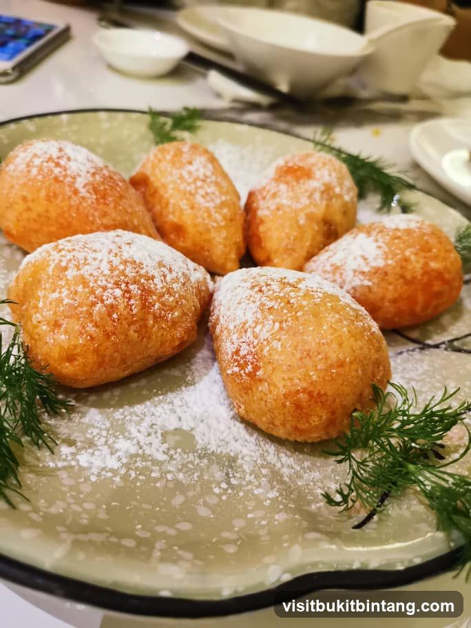 Fried Dough Balls with Powdered Sugar