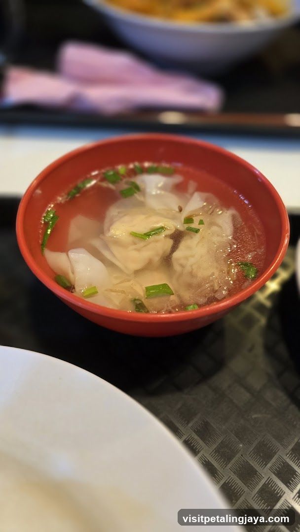Wonton Soup in Red Bowl