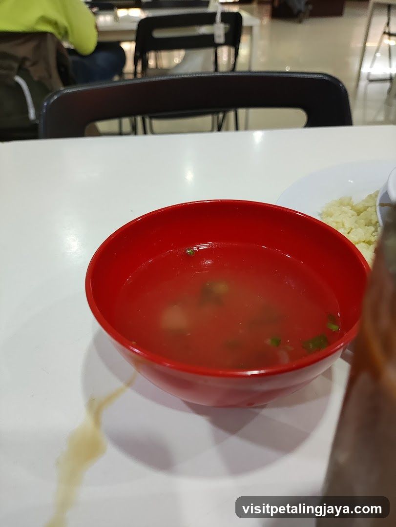 Red Bowl of Soup on White Table