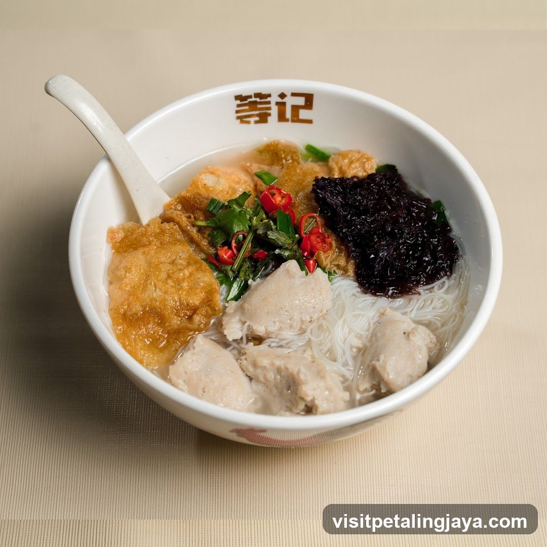 Bowl of Noodle Soup with Toppings