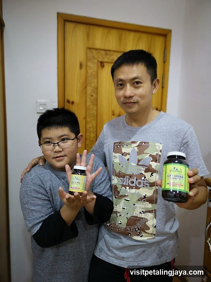Two men holding supplement bottles