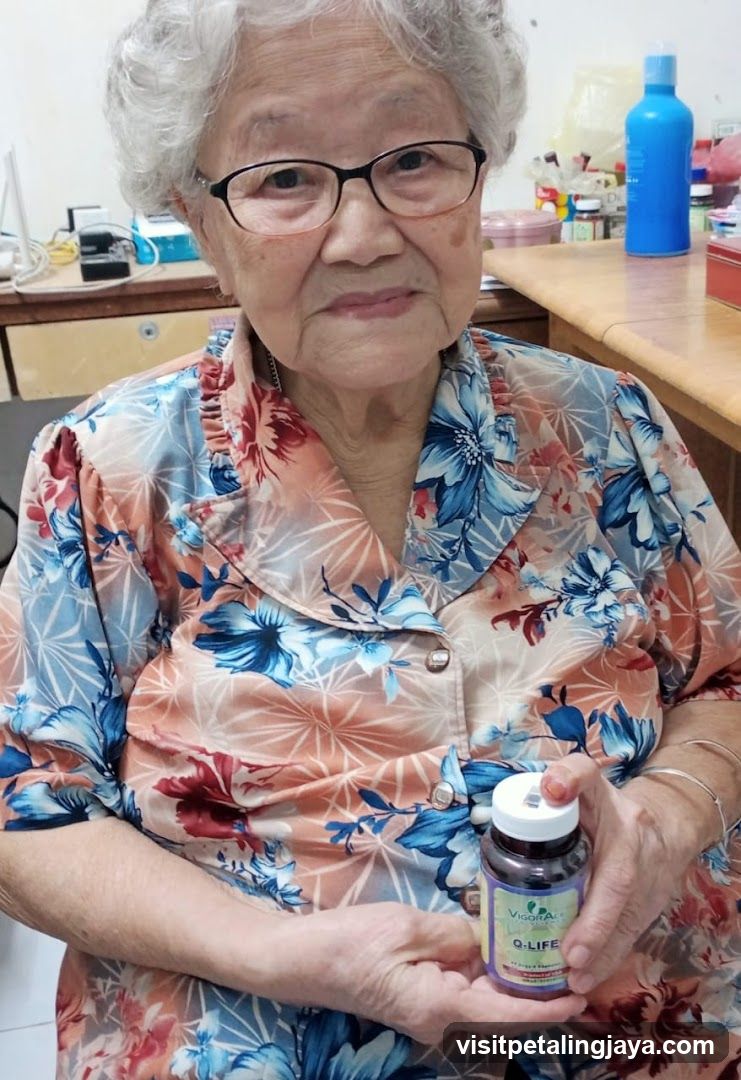 Elderly woman holding supplement bottle