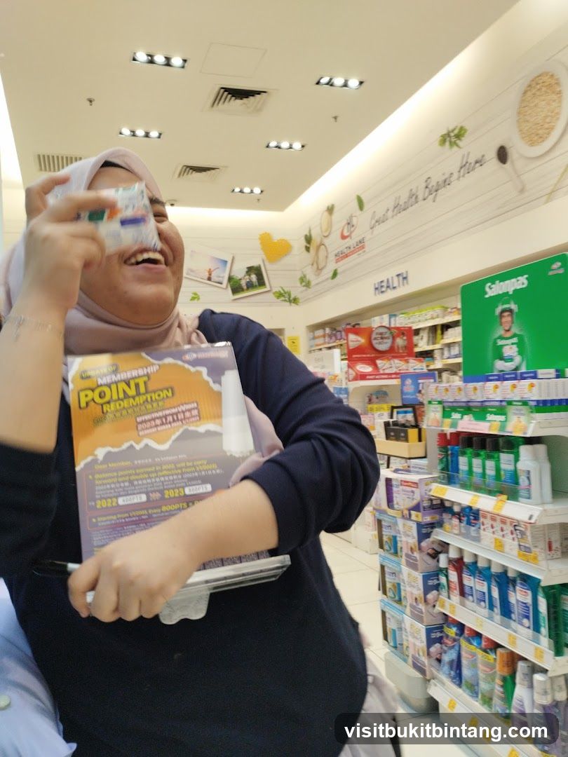 Woman holding promotional material in a store