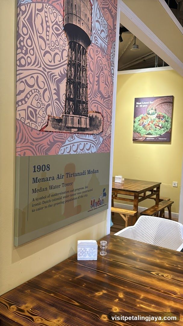 Interior of a cafe or restaurant with historical poster