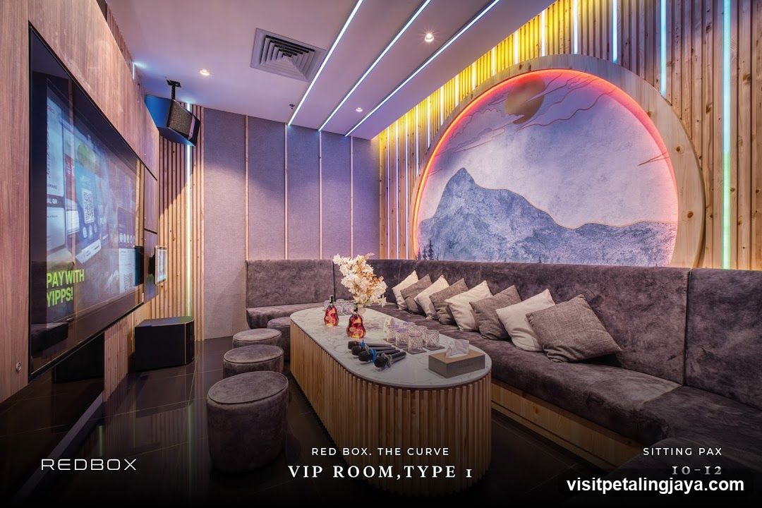 VIP Room Interior with Neon Accents and Mountain Artwork