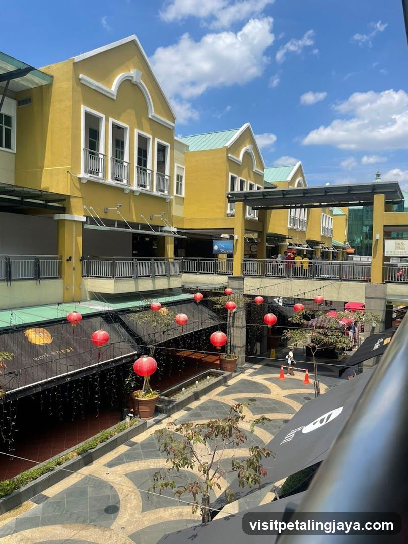 Outdoor Shopping Area with Yellow Buildings