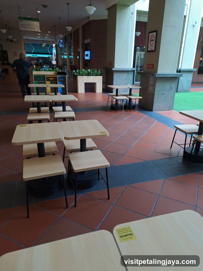 Indoor seating area with tables and chairs