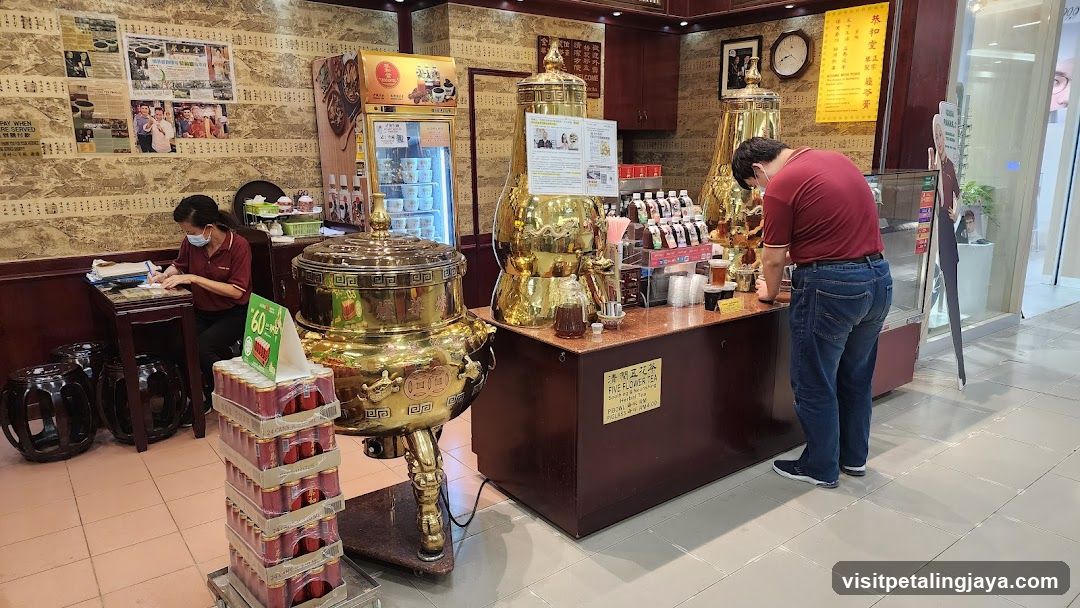 Tea Shop Interior with Brass Vessels and Staff