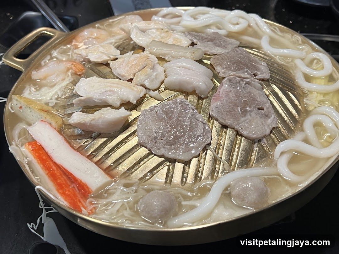Hot Pot with Udon Noodles and Meat Slices