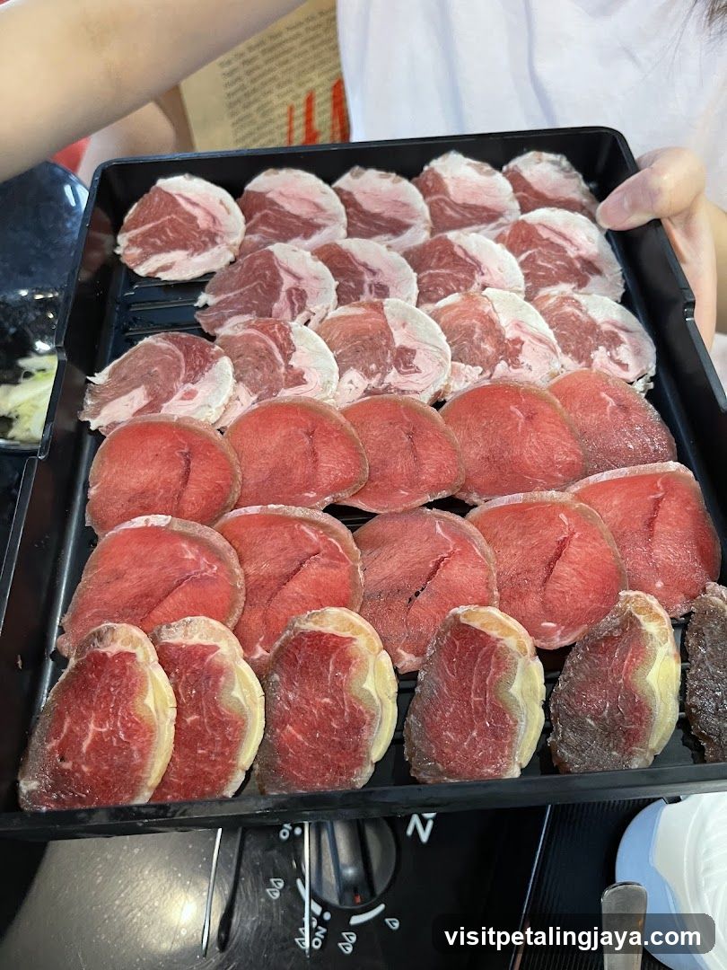 Raw Beef Slices on Tray