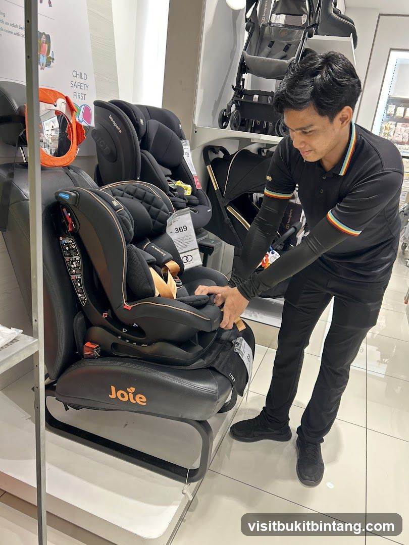 Salesperson demonstrating a car seat