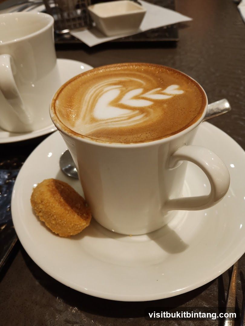 Latte with Latte Art and Cookie