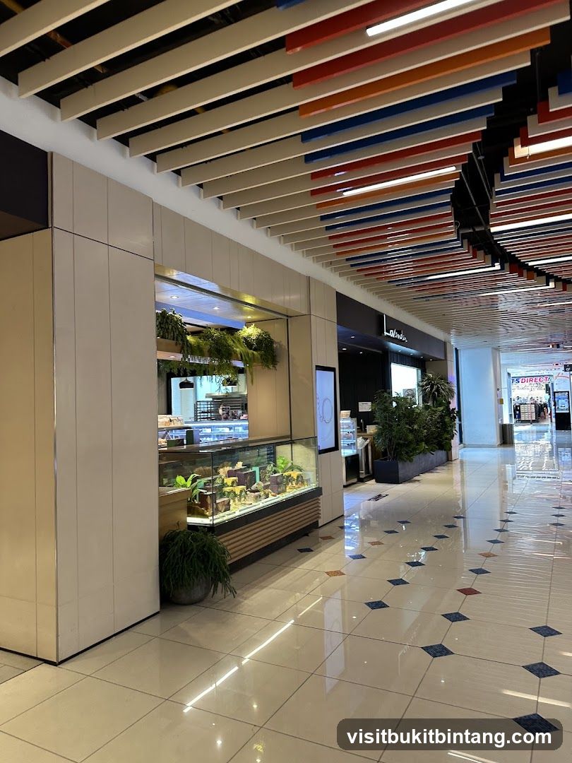 Indoor mall walkway with storefronts